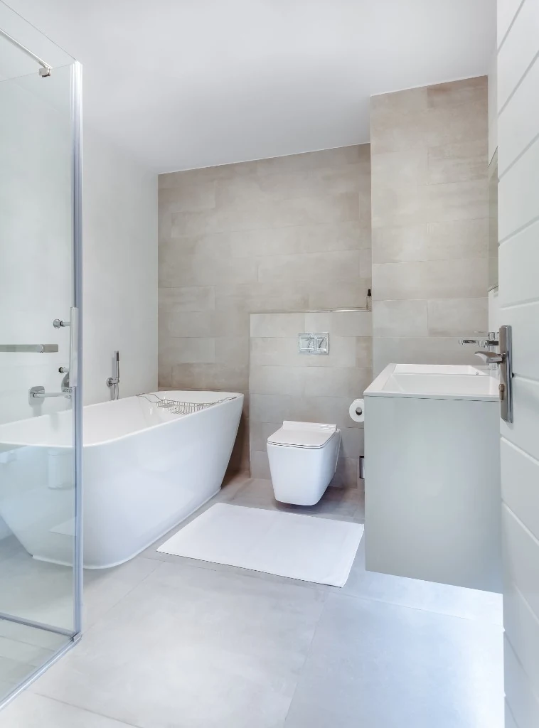 Luxury bathroom renovation with double marble vanity and rose gold faucets in Rosedale, Toronto