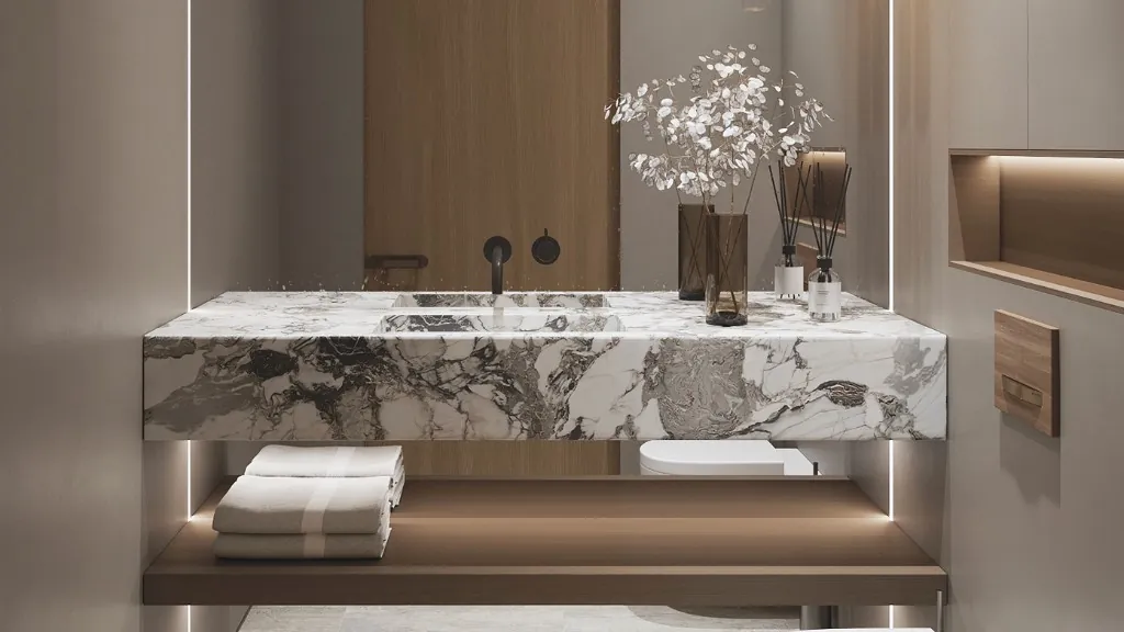 Condo bathroom renovation with marble vanity and brass fixtures in Midtown, Toronto