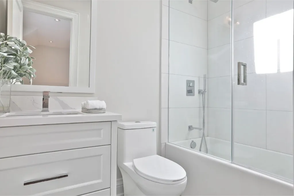 Full bathroom renovation with large format tile and glass shower in Bedford Park, Toronto