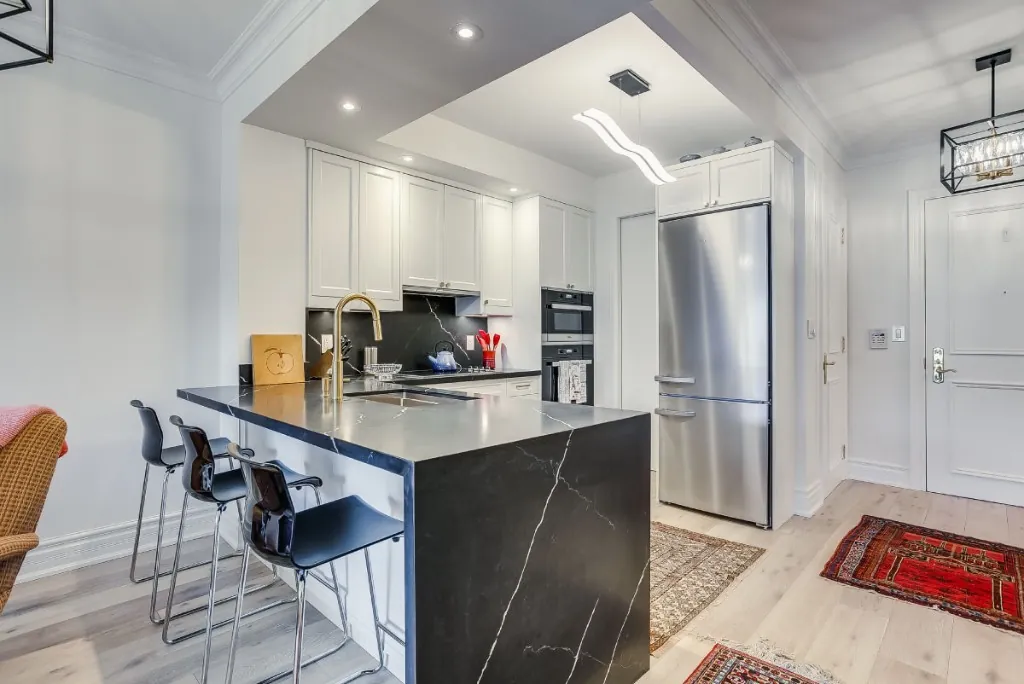 Condo kitchen countertop and waterfall island installation in Yonge and Eglinton, Toronto